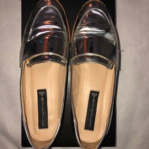 ‘STEVEN’ by Steve Madden silver metallic loafers.